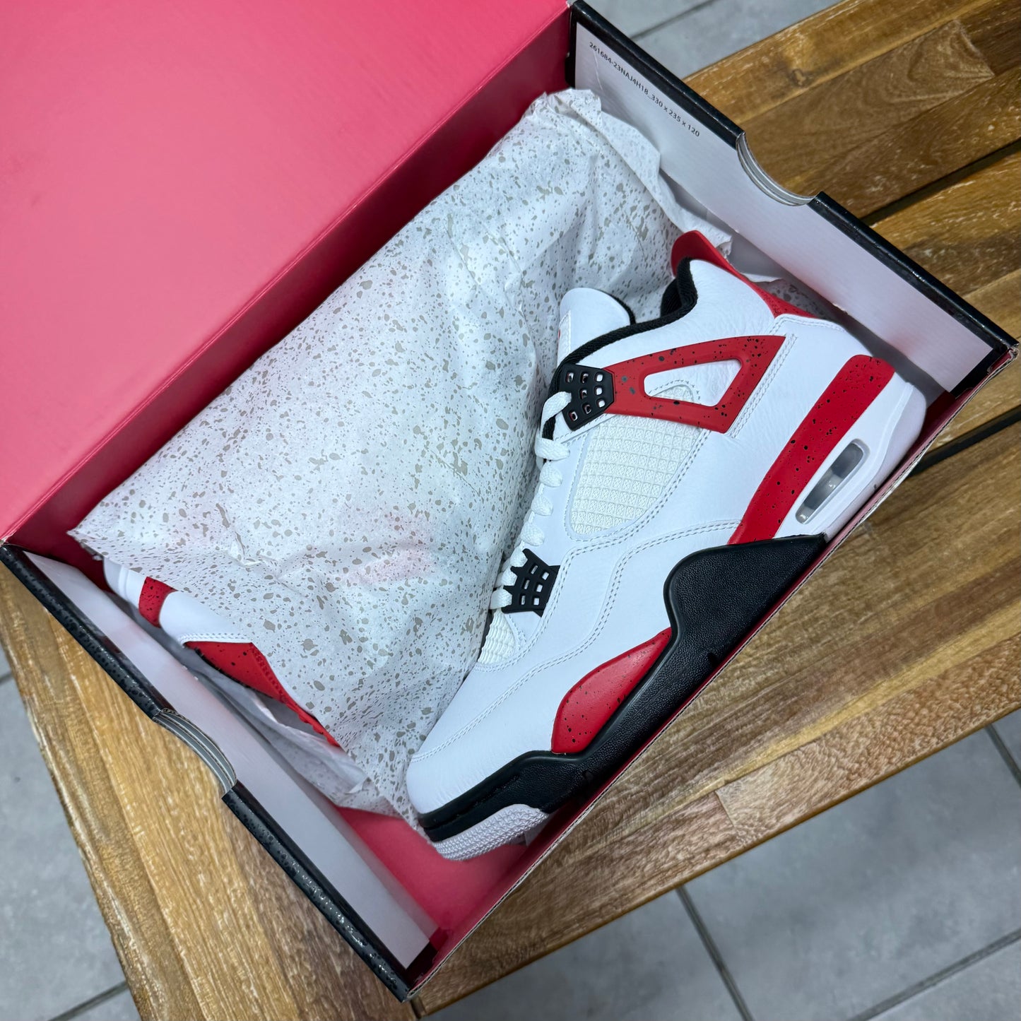 Jordan 4 Red Cement